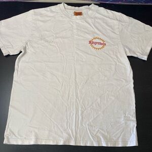 Rhythm. White Tee with Orange Logo